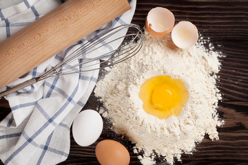 Kitchen table with utensils and ingredients