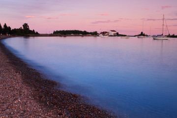 Fototapeta premium Water pier at dusk