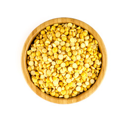 Aerial view of bowl full of chana dal legumes in bowl against wh
