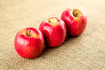 Delicious red apples with stems