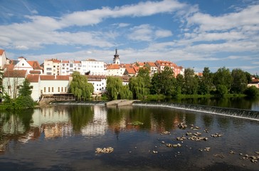 Fototapeta na wymiar Medieval Town Pisek from embankment river Otava in the Southern Bohemia, Czech Republic