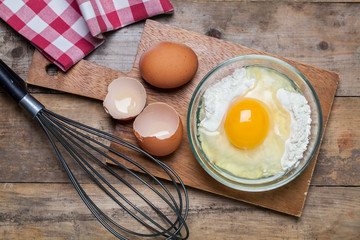 Eggs in a bowl with whisk