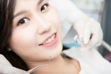 Dentist examining a patient's teeth in the dentist.