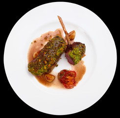 Grilled rack of lamb, english style dish isolated on black