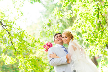 Stylish beautiful happy bride and groom, wedding celebrations