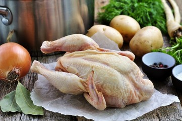 raw organic chicken with vegetables for cooking soup