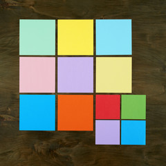 Color bar from paper sticker on wood background in square frame form . Flat design and top view of interface menu concept on desk.