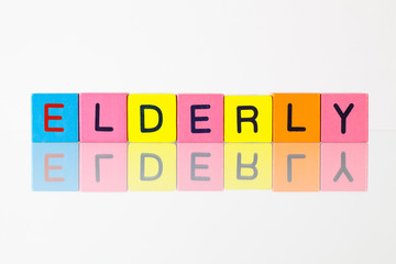 Elderly - an inscription from children's blocks