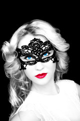 Fashionable woman in mask with red lips