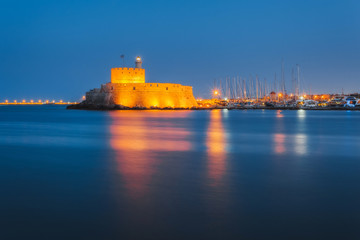 Fototapeta premium Fortress of St. Nicholas in the evening. Rhodes. Greece