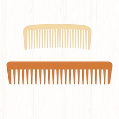 Two wooden comb hair: pale and dark. Hairbrushes on white wooden