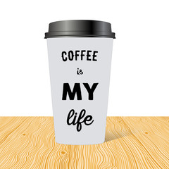 Plastic cup of coffee with hand drawn inscription: Coffee is my life