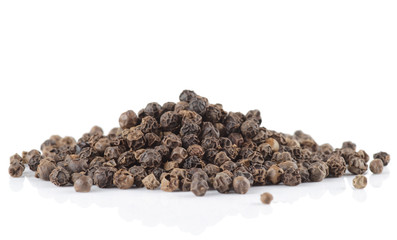 Heap or black pepper isolated on white