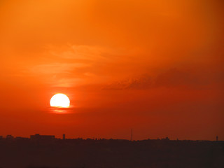 Obraz premium minimalist sunset, orange sky, city silhouette wallpaper