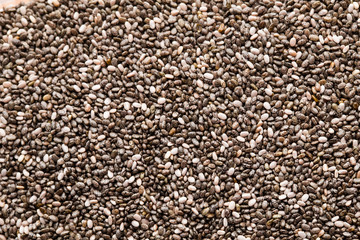 Chia seeds on the background.