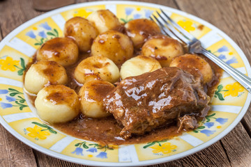 Dumplings with pork sauce.