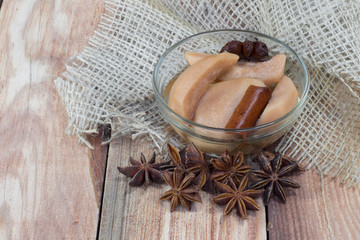 Pear Compote on Wooden Table with Star Anise & Cloves