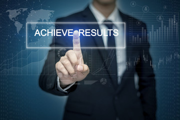 Businessman hand touching ACHIEVE RESULTS button on virtual scre