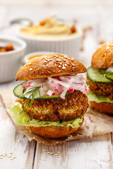 Falafel burger on a wooden rustic table