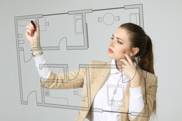 female architect working with a virtual apartment plan