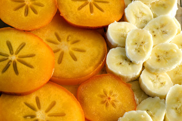 background of banana and persimmon