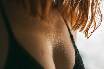 Detail of a Wet Woman Breast
