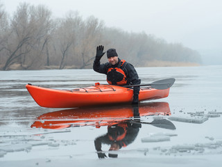 sports cheerful man in kayak