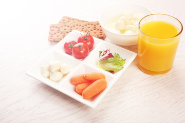 Healthy foods on light wooden background. healthy eating concept.
