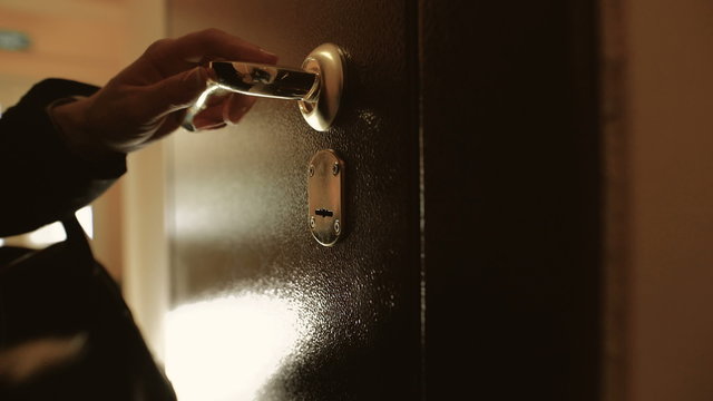 Inserting a key into a house front door