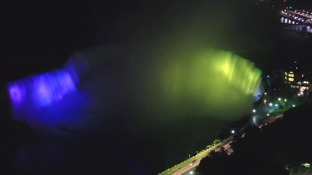 Time lapse Niagara Horseshoe Falls  is illuminated with festival rainbow colors at night, 4k time lapse