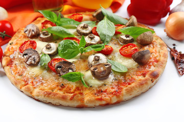 Delicious pizza and fresh vegetables on white background, close up