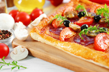 Rectangle delicious pizza on the table, close-up