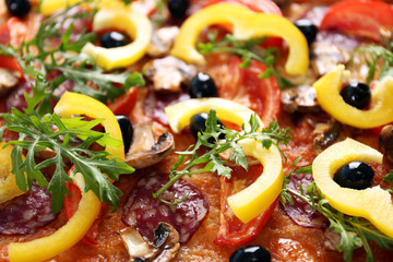Background of delicious pizza, close-up