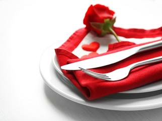 Festive table setting for Valentines Day on light background