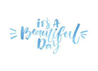 It's a beautiful day. Watercolor brush lettering. Inspirational quote.