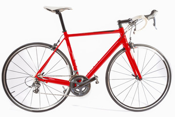 Fototapeta na wymiar Cycling Concept. Professional Carbon Fiber Road Bike Isolated Over White