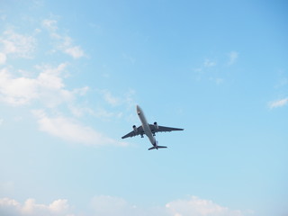 Fototapeta na wymiar Airplane and blue sky