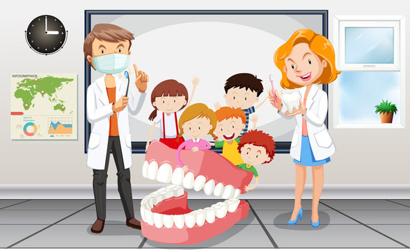 Dentists and children in classroom