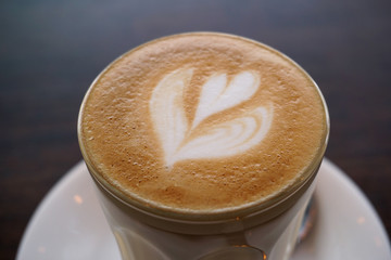 Cup of hot coffee put on the table