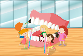 Children cleaning teeth together
