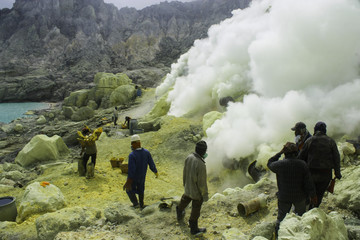 People mining sulfur at kawah ijen. It worth Rp.650 per kilogram.  Photo by Yudhistira Dharma