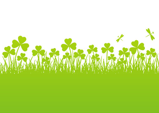 Spring background with clover silhouettes 