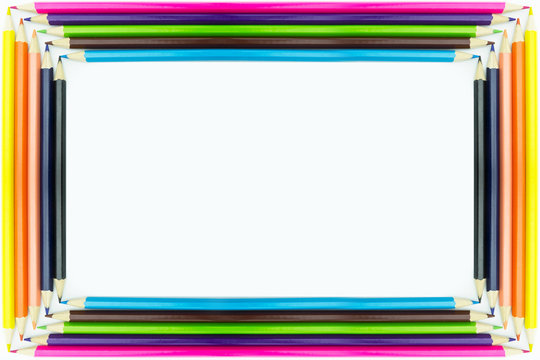Frame form multicolored pencils isolated on white background.