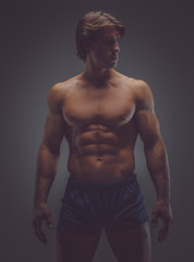 Fototapeta premium Shirtless muscular man in a shorts.