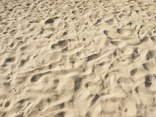 closeup of sand pattern of a beach in the summer