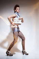 A full body portrait of a woman in casual clothes.