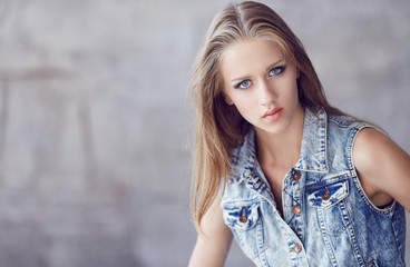 Fototapeta premium Blue eyes woman with long blond hair.