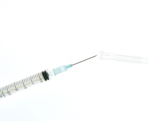 Fototapeta premium Syringe and needle being recapped, a common cause of needlestick injuries