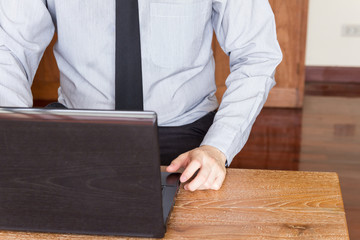 business man using laptop computer