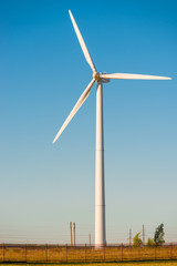 Fototapeta premium the windmill close-up in a sunny summer day